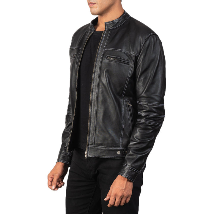 detail-view-of-white-thread-stitching-on-black-biker-jacket