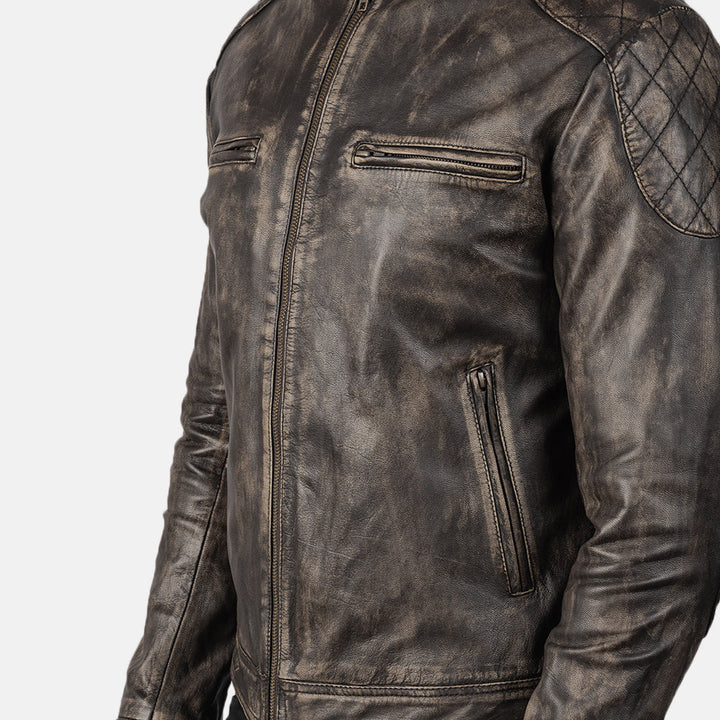 Brown leather jacket with quilted shoulder design on a white background